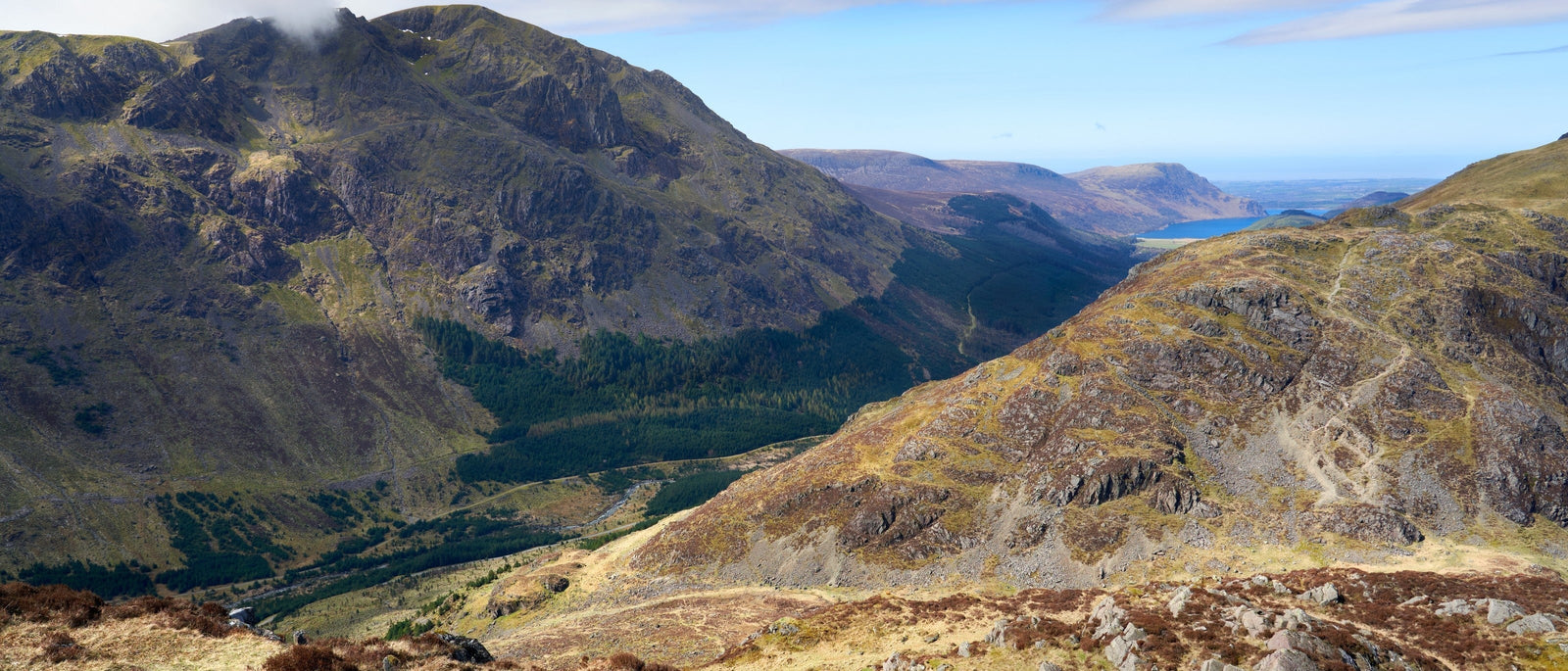 Views down into Ennerdale valley with the summit of Pillar high above, viewed from just above Scarth Gap. By Duncan Andison